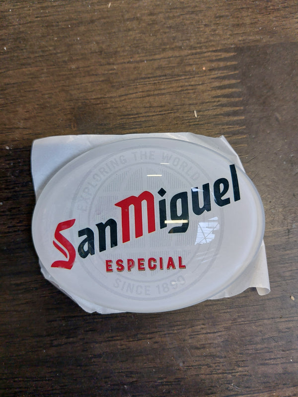 San Miguel oval badge