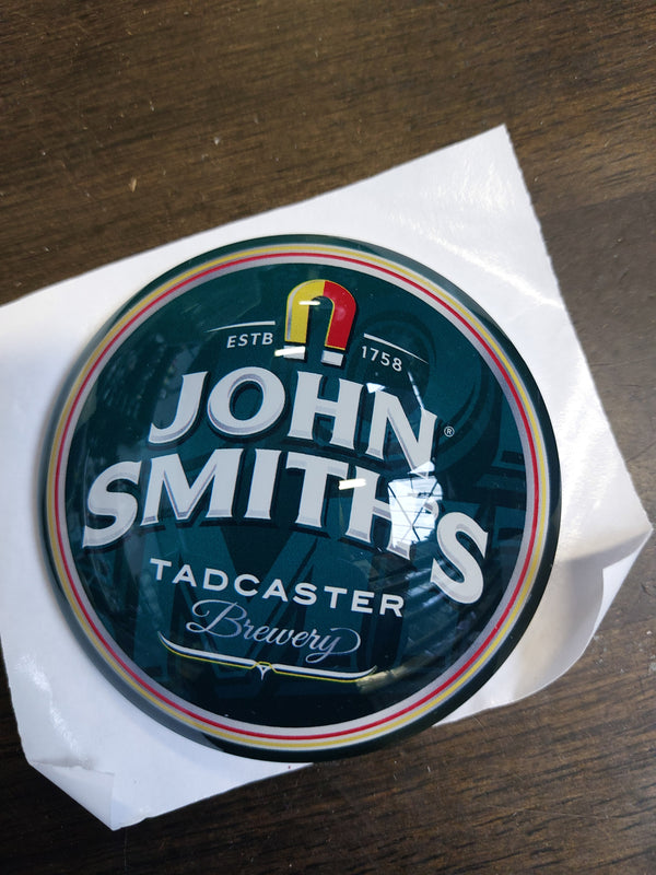 John smiths round badge