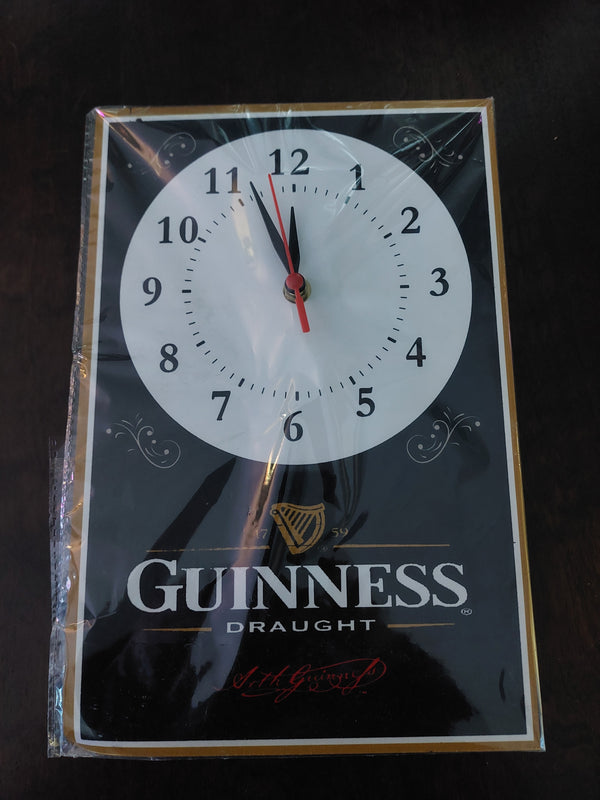 Guinness tin clock