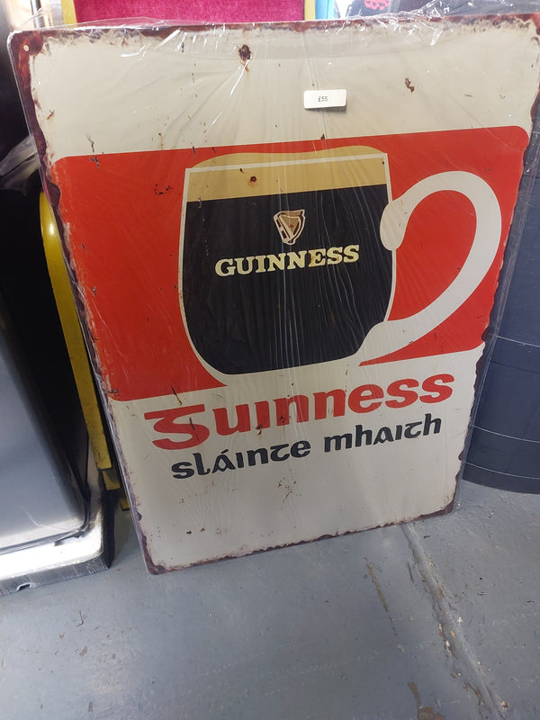 Large metal guinness sign