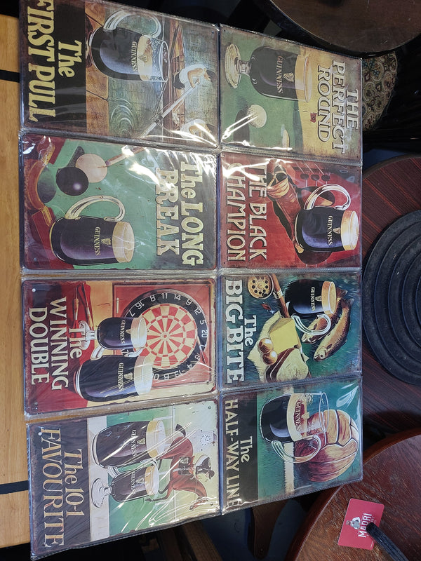 Collection of 8 guinness sporting signs