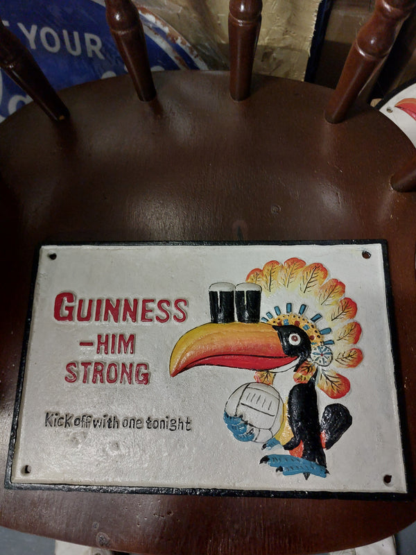 Guinness him strong cast iron sign