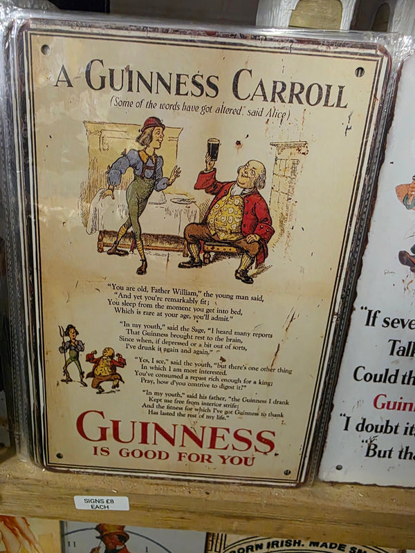 A GUINNESS CARROLL METAL SIGN