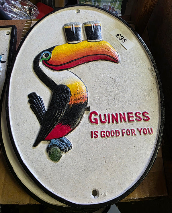 Guinness toucan cast iron sign